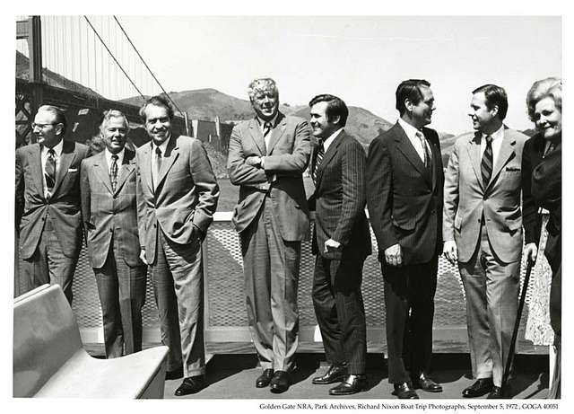Nixon standing on boat with politicians