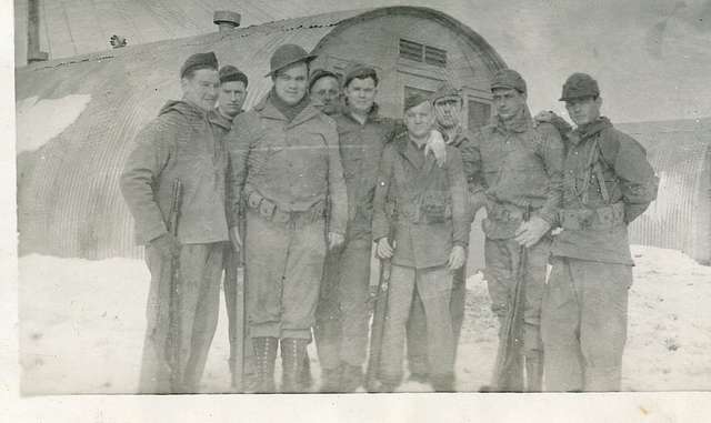 A group of American soldiers are shown during World War II